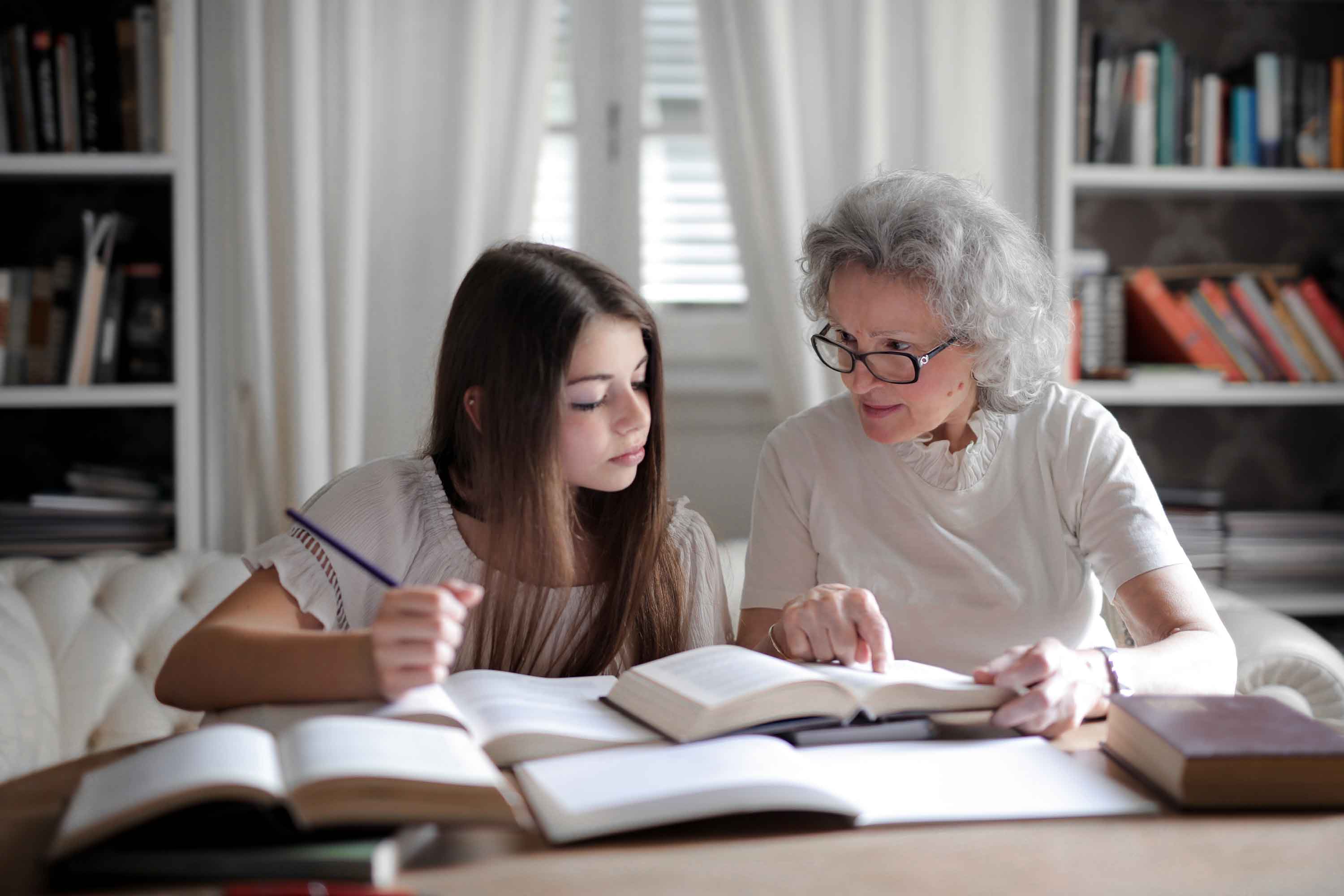 A student and mentor deep in study.