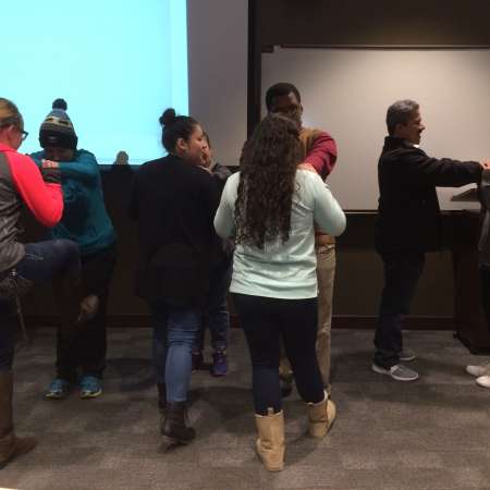 Students and parents practice self defense.