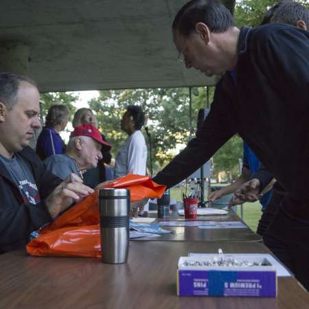 Runners pick up packets the morning of the run.