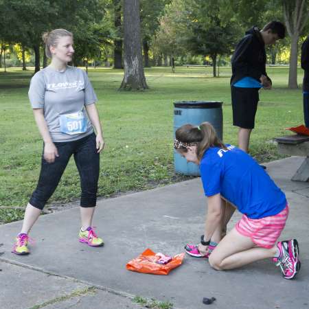 Runners stretch and prepare for the race.