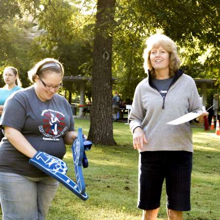 Volunteers prepare to cheer on runners.