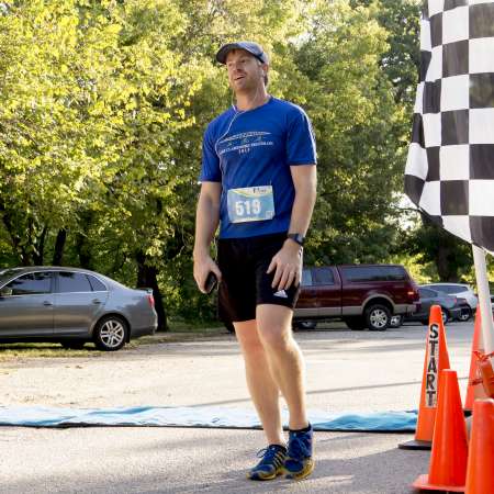 3rd Place Runner rests after finishing the race.