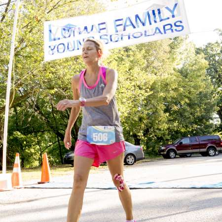 2nd Place runner after crossing finish line.