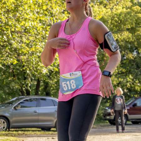 Runners cross the finish line.