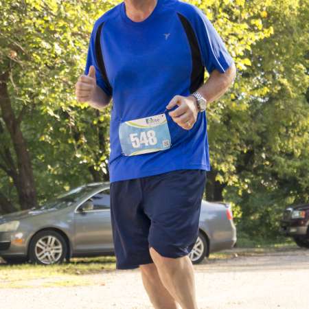 Runners cross the finish line.