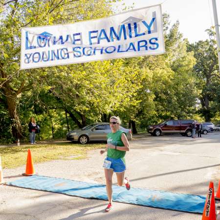 Runners cross the finish line.