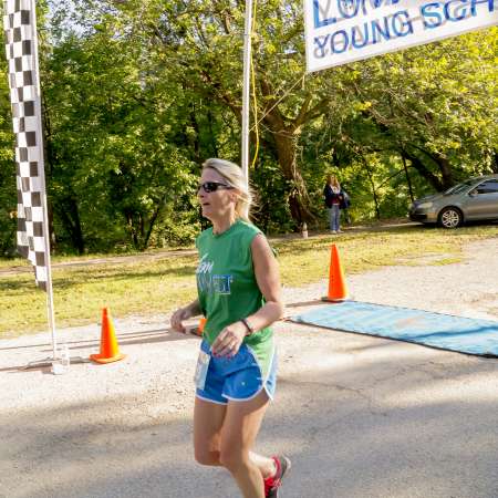 Runners cross the finish line.