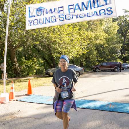 Runners cross the finish line.