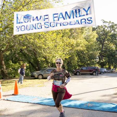 Runners cross the finish line.