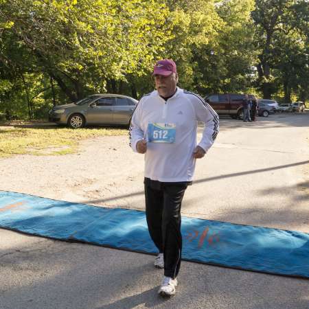 Runners cross the finish line.