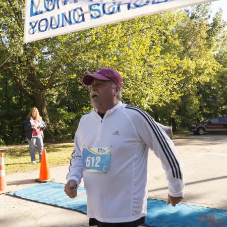 Runners cross the finish line.