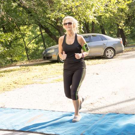 Runners cross the finish line.