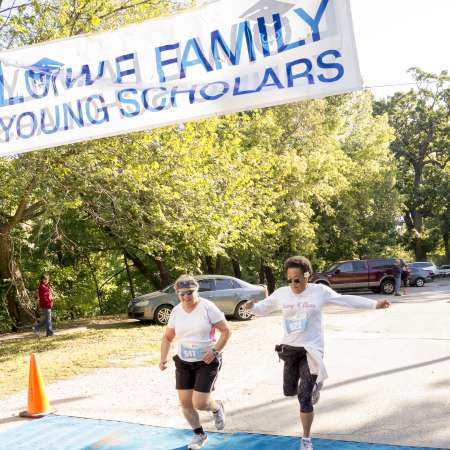 Runners cross the finish line.