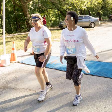 Runners cross the finish line.