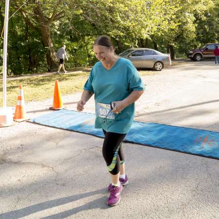 Runners cross the finish line.