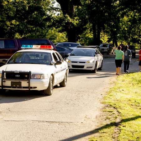 Police finish helping with the race.