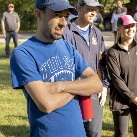 Runners listen to the awards.