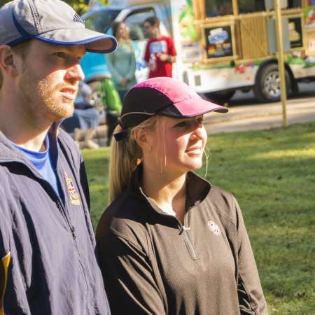 Runners listen to the awards.