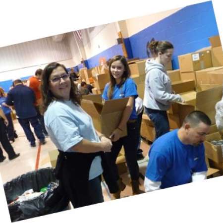 Group aids in volunteering at Salvation Army.