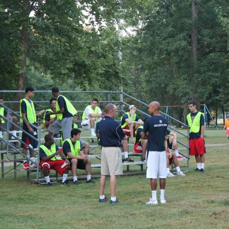 Volunteers receive instruction before going out on the track.