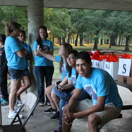 Volunteers arrive early and wait for instructions.