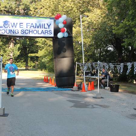 Runners cross the finish line.