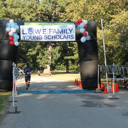 Runners cross the finish line.