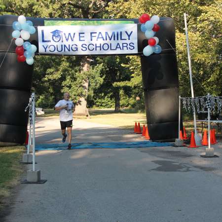 Runners cross the finish line.