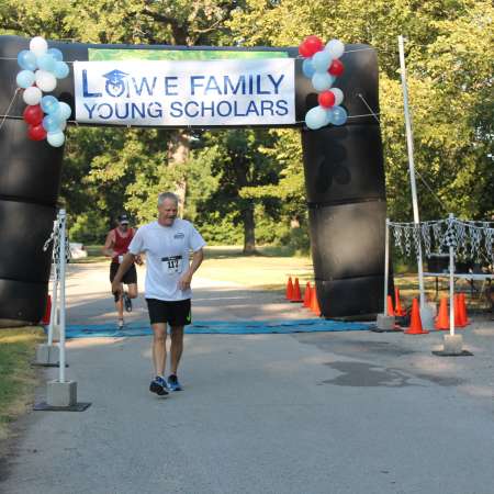 Runners cross the finish line.