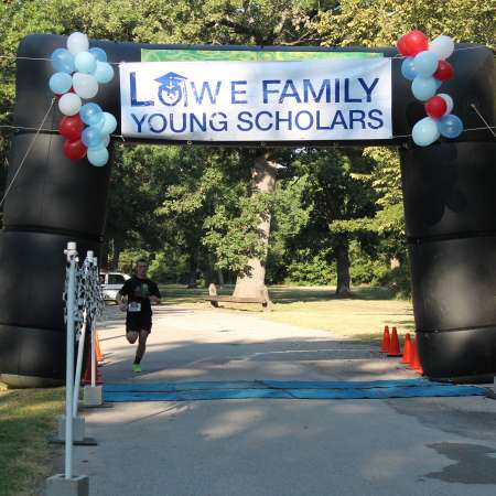 Runners cross the finish line.