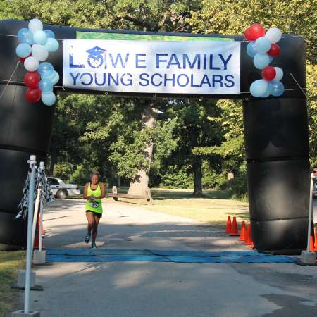 Runners cross the finish line.