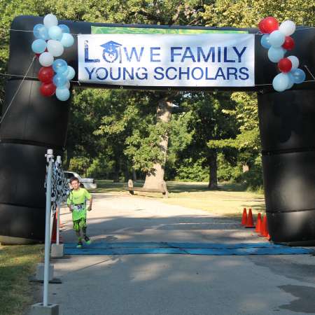 Runners cross the finish line.