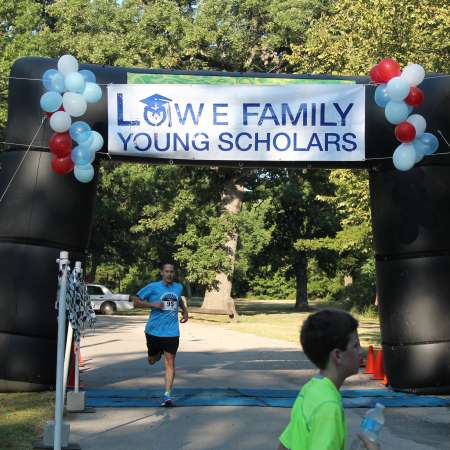 Runners cross the finish line.