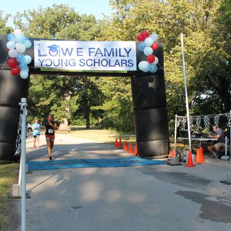 Runners cross the finish line.