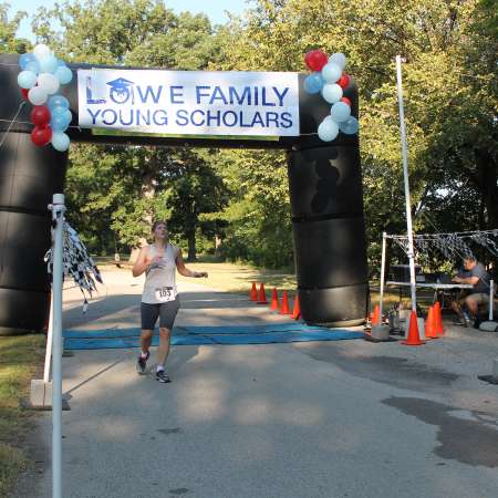 Runners cross the finish line.