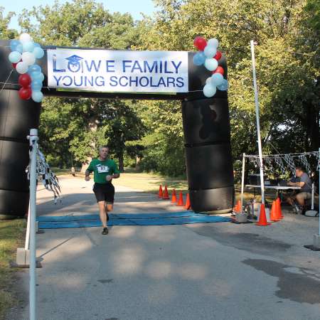 Runners cross the finish line.