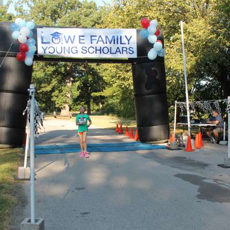 Runners cross the finish line.