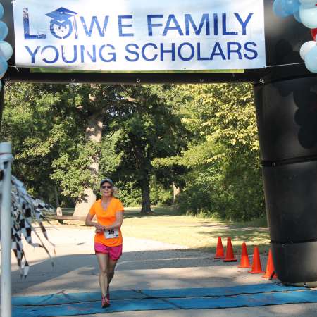 Runners cross the finish line.