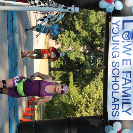 Runners cross the finish line.