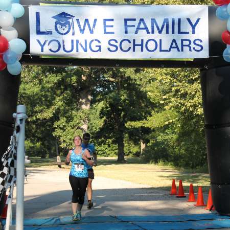 Runners cross the finish line.