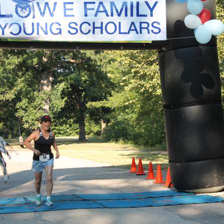 Runners cross the finish line.