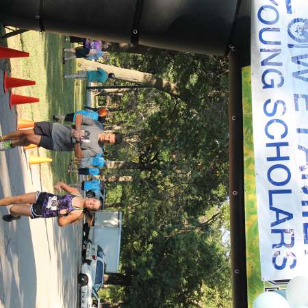 Runners cross the finish line.