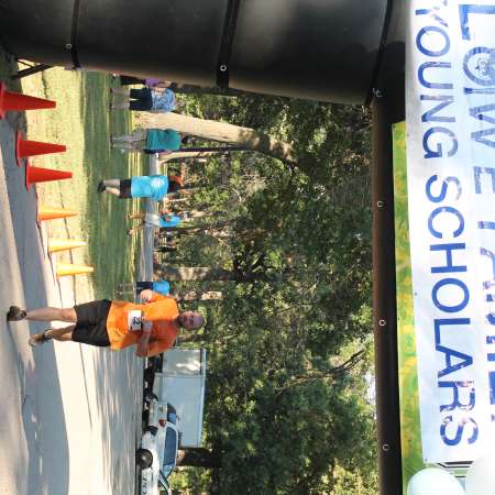 Runners cross the finish line.