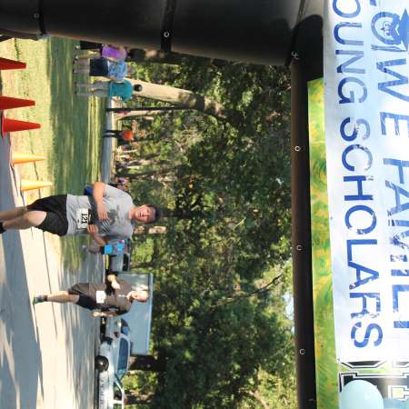 Runners cross the finish line.