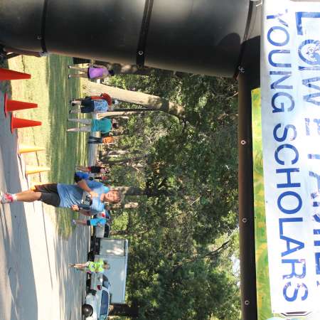 Runners cross the finish line.