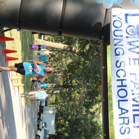 Runners cross the finish line.