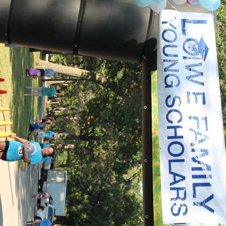 Runners cross the finish line.