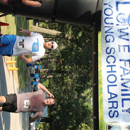 Runners cross the finish line.