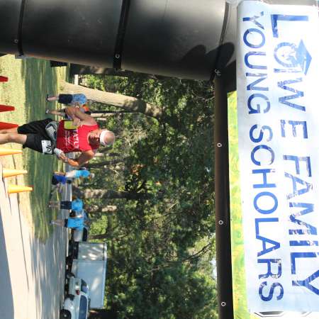 Runners cross the finish line.