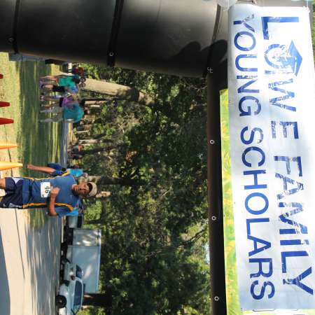 Runners cross the finish line.